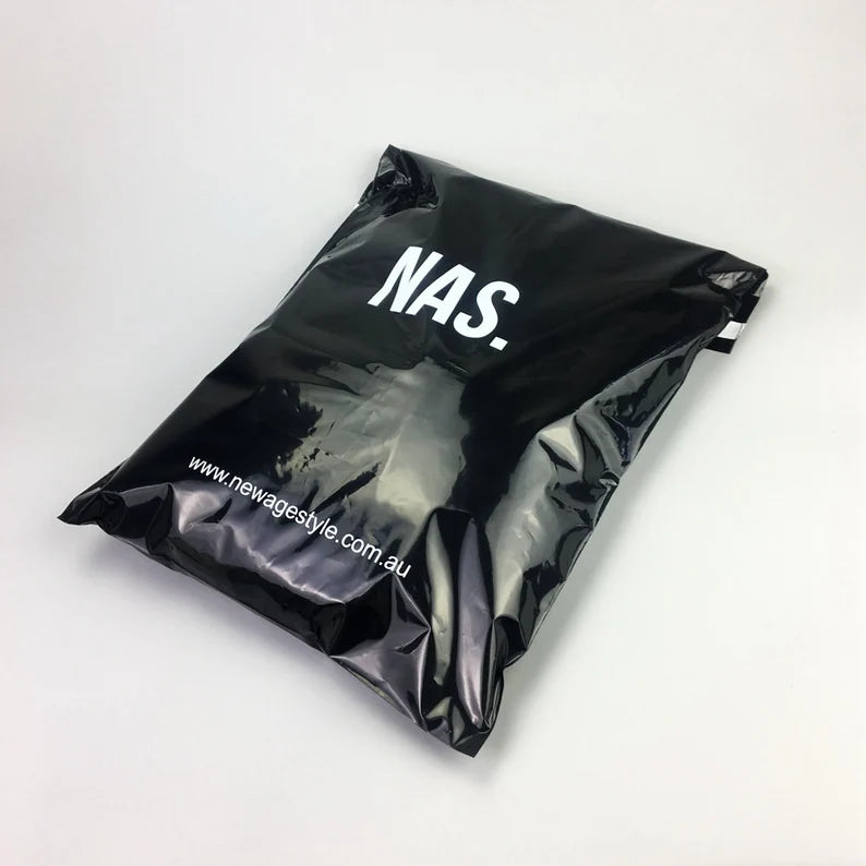 Custom black poly mailer bag featuring the brand name 'NAS.' for stylish and eco-friendly shipping solutions.