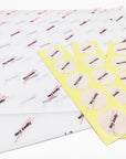 branded 15lb tissue paper with sticker