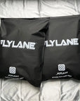 Custom black zipper bags by Flylane, designed for premium packaging and secure closure.