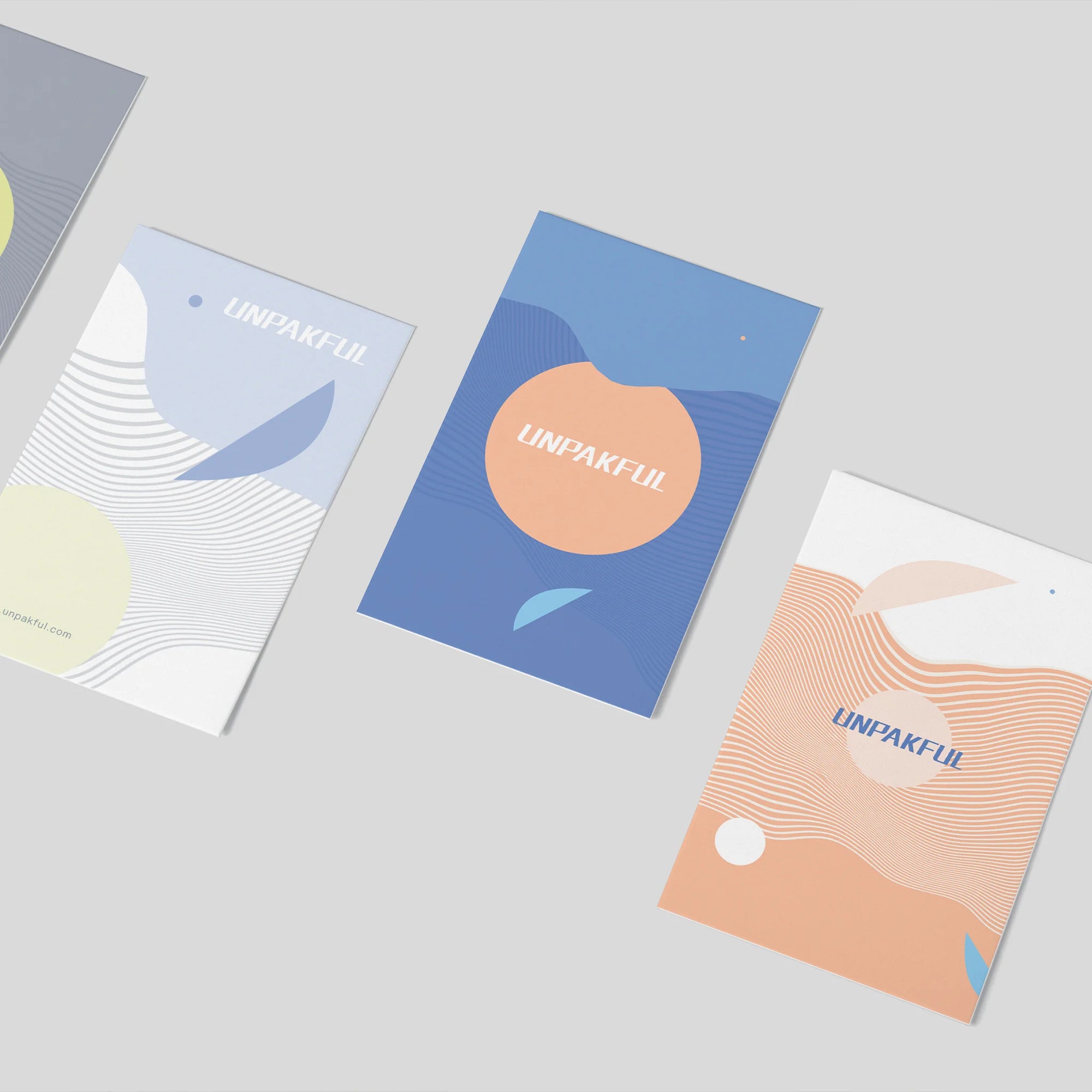 Custom cards featuring modern designs with abstract shapes and vibrant colors for unique product packaging enhancement.