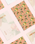 Custom cards with floral designs, enhancing product packaging for a unique brand identity.