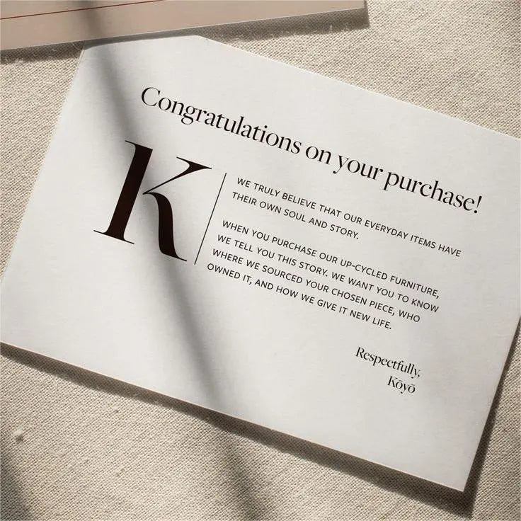 Custom congratulations card showcasing a brand story for customer purchases, featuring elegant typography and personal message.