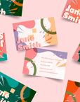 Colorful custom business cards featuring the name Jane Smith, showcasing modern and artistic design elements.