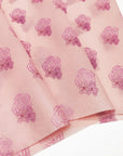 Custom tissue paper featuring pink rose and floral designs, ideal for elegant branding and packaging solutions.