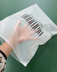 Custom frosted zipper bag with a stylish design, showcasing durability and elegance for various packaging needs.