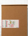Custom rectangle sticker on a cardboard box labeled 'Mockup Security Sticker' for branding and packaging.