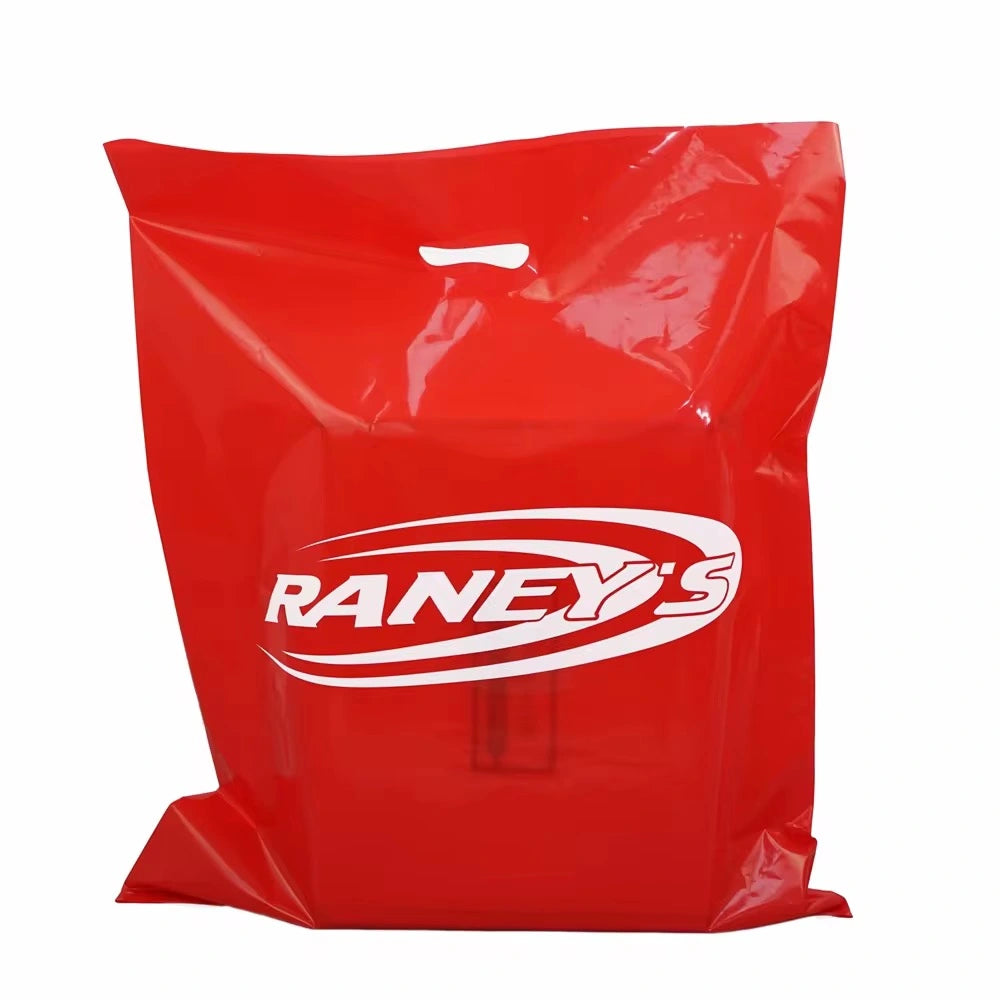 Custom red die cut handle bag featuring Raney's logo, perfect for retail and promotional use.