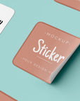 Custom square sticker mockup showcasing personalized design on a pastel background.