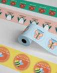 Custom round roll labels featuring colorful animal designs for effective packaging and branding solutions.