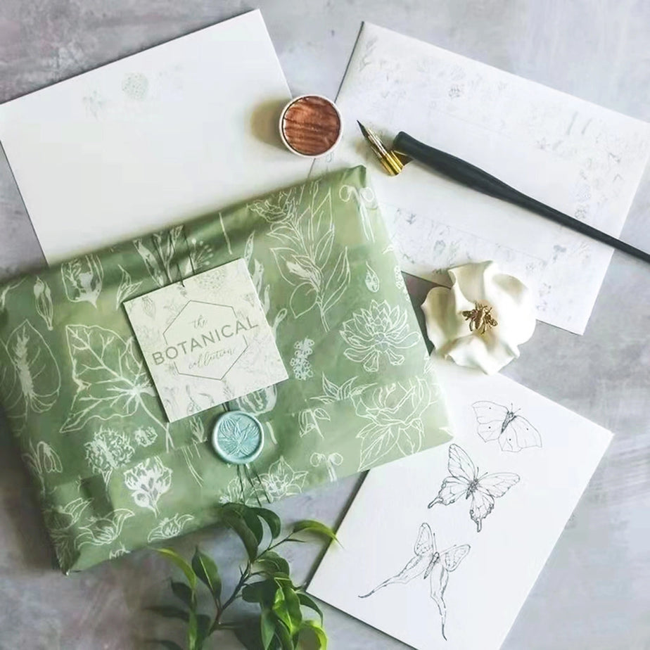 green tissue paper with prited leafs