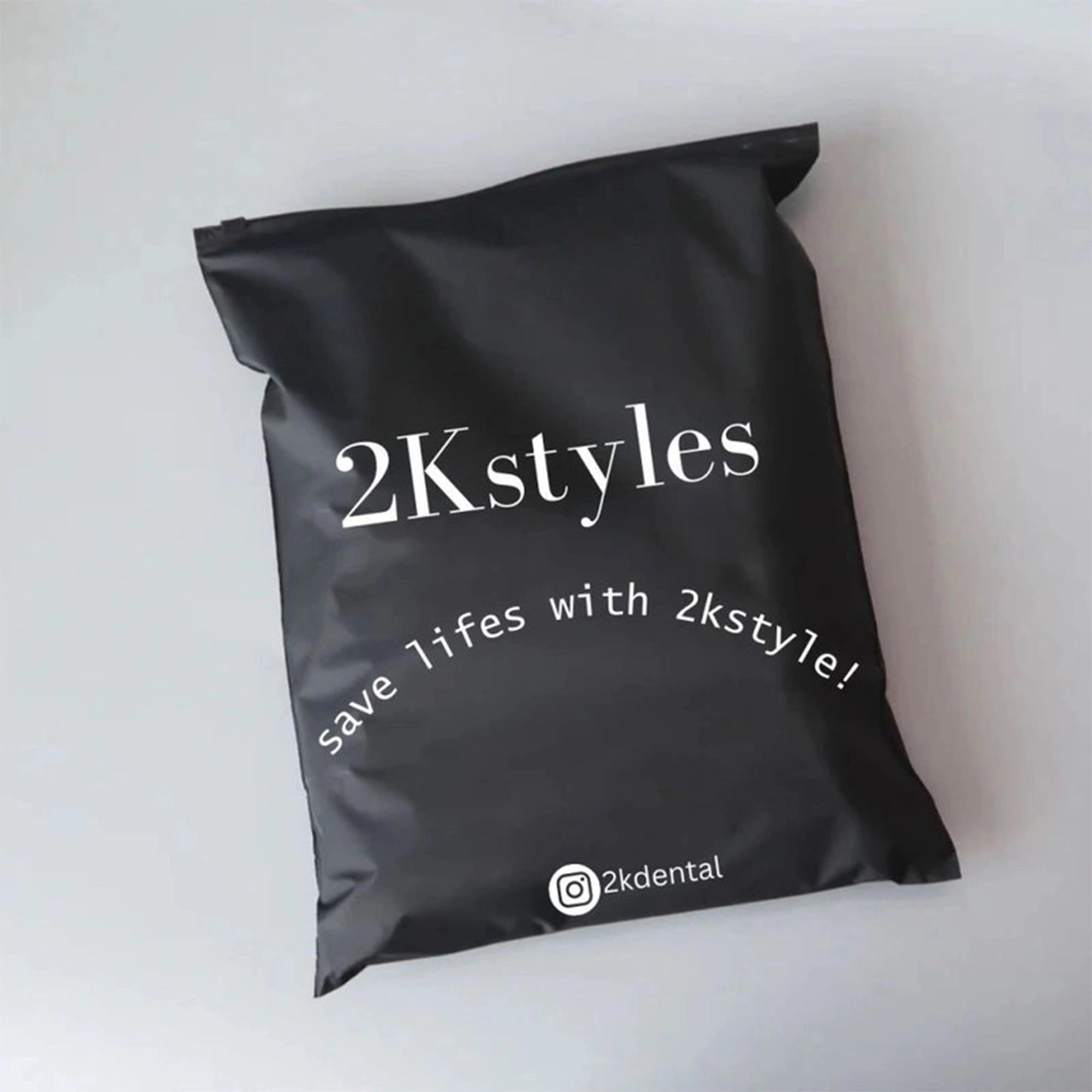 Custom black zipper bag with logo and slogan for 2Kstylest, promoting premium branding and secure packaging.