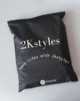 Custom black zipper bag with logo and slogan for 2Kstylest, promoting premium branding and secure packaging.