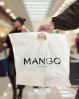 Custom die cut handle bag featuring the Mango Barcelona logo, ideal for retail and branding opportunities.