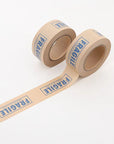 Two rolls of water-activated tape with 'FRAGILE' label for secure packaging and shipping.