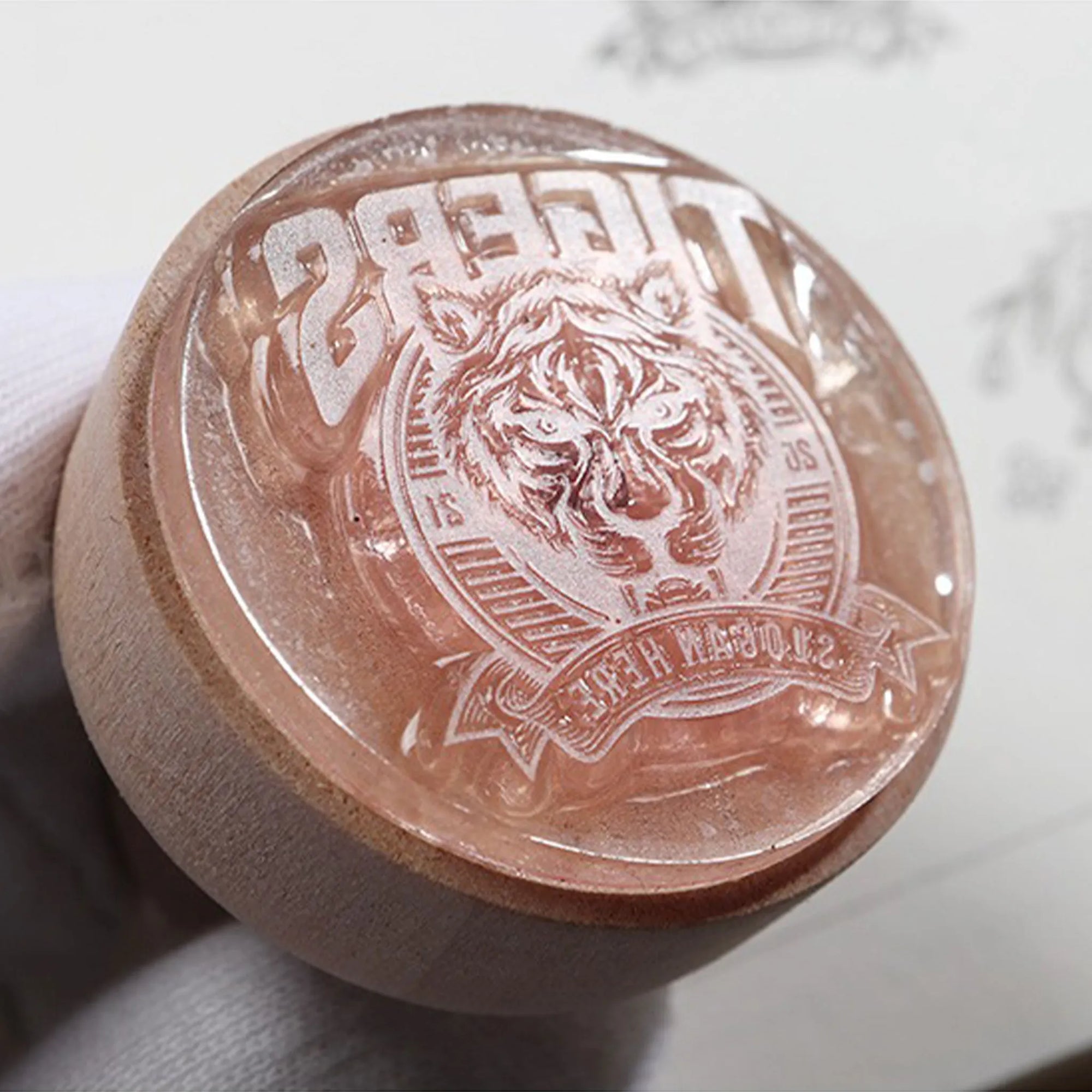 Custom rubber stamp featuring a detailed tiger design with the word "TIGERS" etched on the surface.