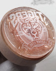 Custom rubber stamp featuring a detailed tiger design with the word "TIGERS" etched on the surface.