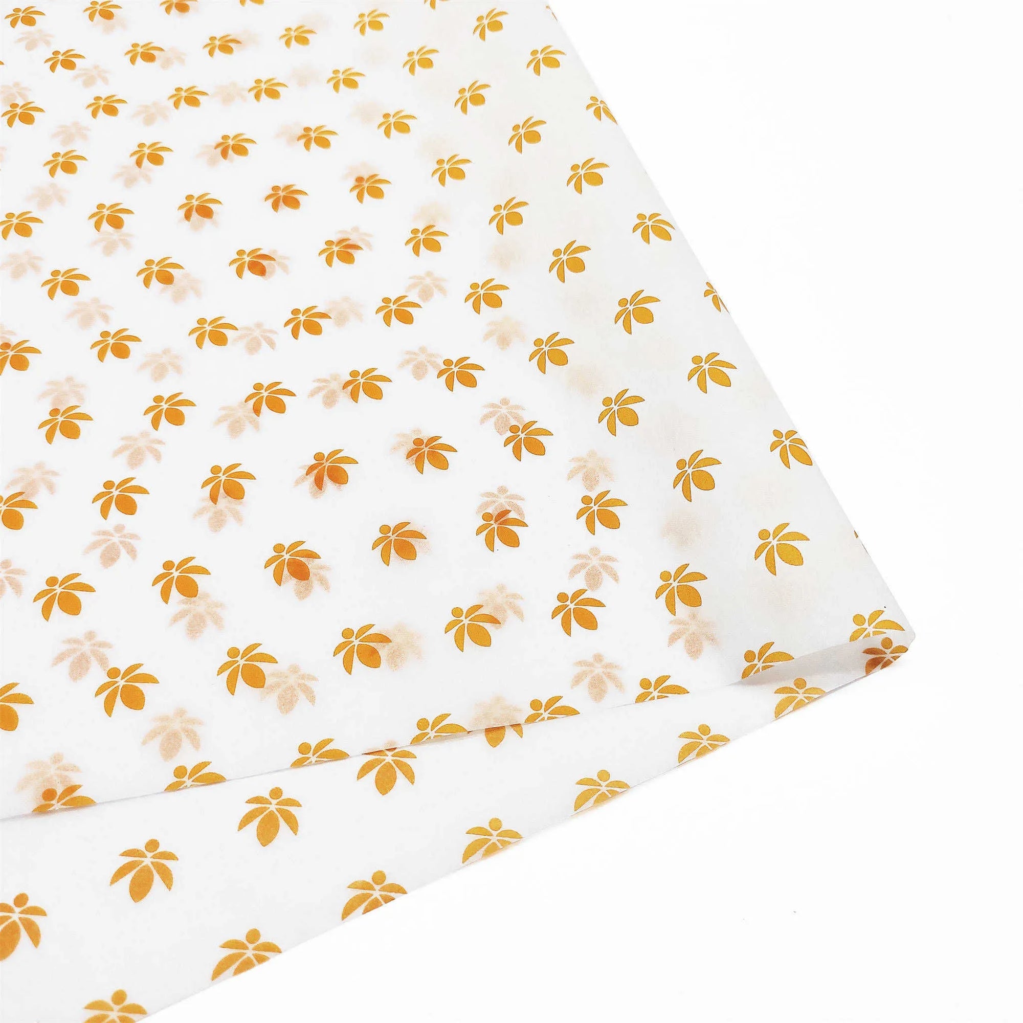 Custom tissue paper with a delicate floral pattern in orange and white, ideal for elegant packaging and branding.