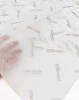 Custom tissue paper featuring Givova logo, showcasing elegance and brand identity for premium packaging.