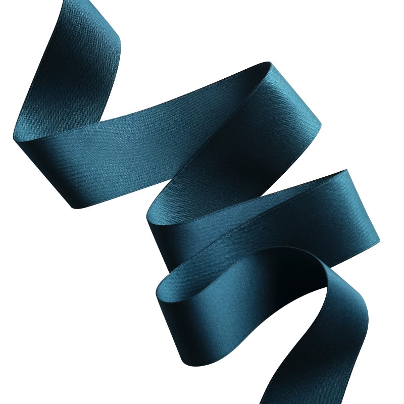 Custom teal polyester cotton ribbon, perfect for gift wrapping and decorative projects.