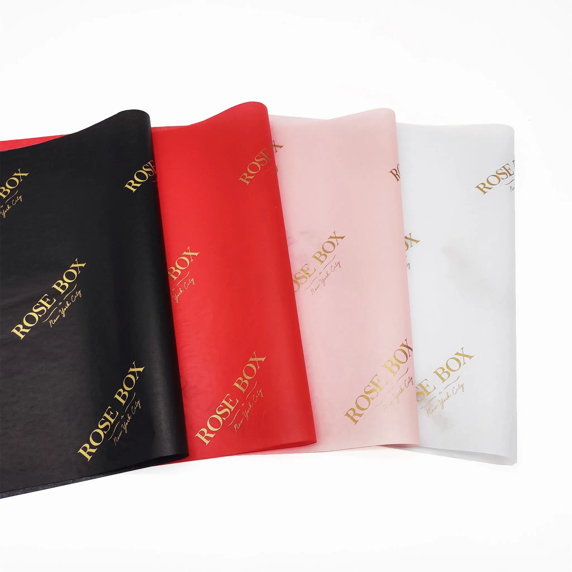 Custom tissue paper in black, red, pink, and white with gold "ROSE BOX" branding. Enhance your packaging elegance.