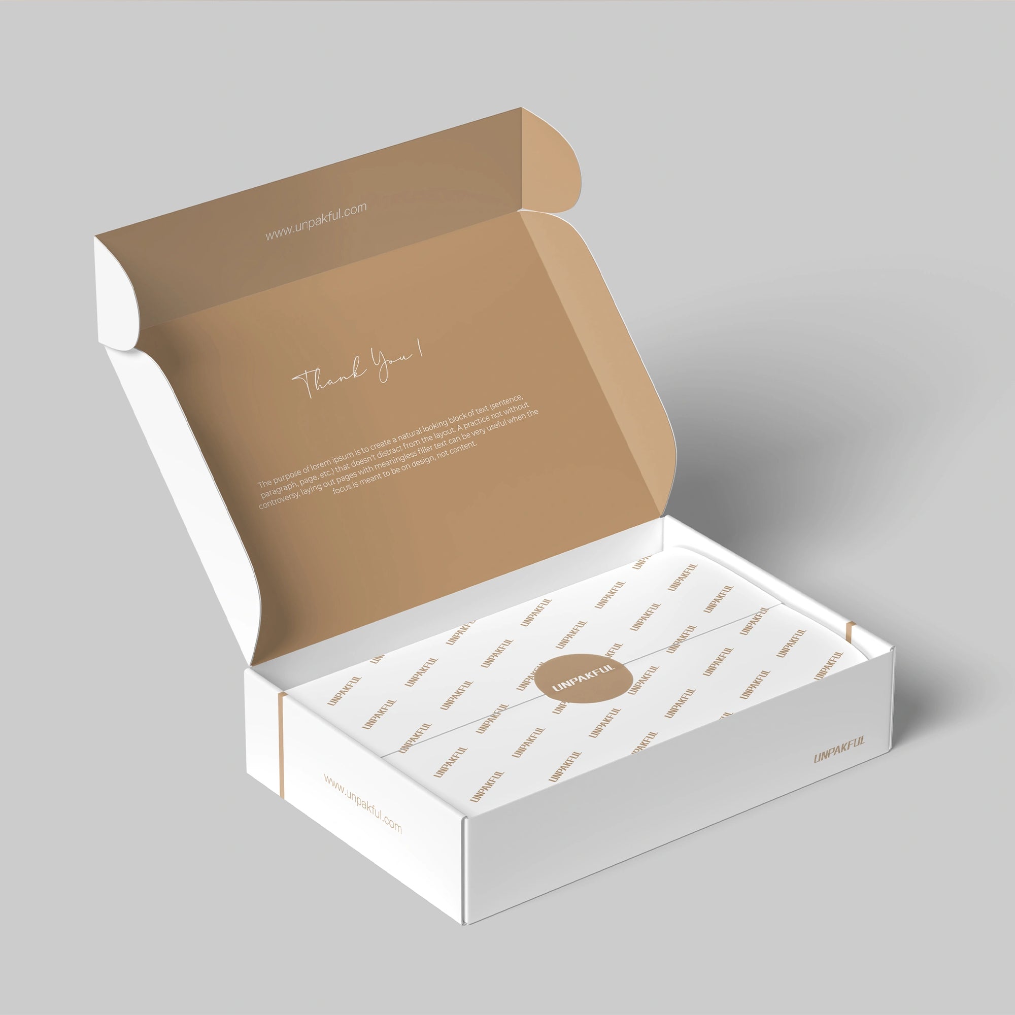 Custom mailer box in open position with a thank you note and elegant interior design ready for packaging.